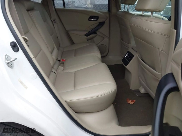 2018 Acura RDX w/Advance Pkg with VIN 5J8TB4H70JL009007, listed as a IAAI auction lot 40382722 with 104,933 mi miles. Bid and sale history available at carsss.com. Image 8.