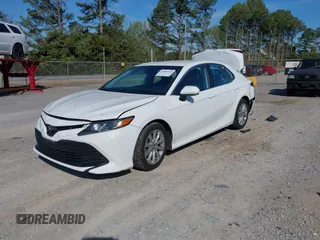 2020 Toyota Camry LE with VIN 4T1C11AK9LU315906, listed as a IAAI auction lot 41809360 with 97,401 mi miles. Bid and sale history available at carsss.com. Image 2.