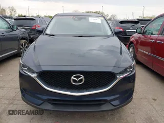 2017 Mazda CX-5 Touring with VIN JM3KFBCL2H0213740, listed as a IAAI auction lot 42165094 with 112,240 mi miles and . Bid and sale history available at DreamBid. Image 12.