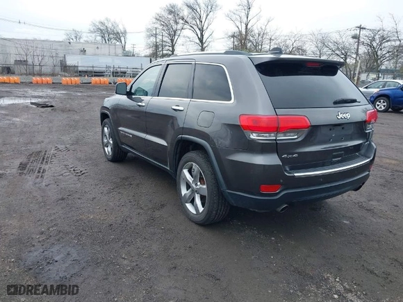 2014 Jeep Grand Cherokee Limited with VIN 1C4RJFBG8EC172946, listed as a IAAI auction lot 42048712 with 157,150 mi miles. Bid and sale history available at carsss.com. Image 3.
