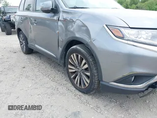 2020 Mitsubishi Outlander SE z VIN JA4AD3A37LZ044719, wystawiony jako IAAI lot #39303659 z przebiegiem 86 662 mil mil oraz . Historia ofert i sprzedaży dostępna na DreamBid. Obrazek 6.