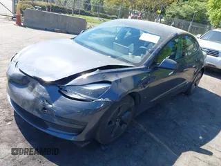 2023 Tesla Model 3 with VIN 5YJ3E1EA6PF645110, listed as a IAAI auction lot 42044357 with 24,352 mi miles and . Bid and sale history available at DreamBid. Image 22.