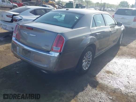 2014 Chrysler 300 with VIN 2C3CCAAG4EH159911, listed as a IAAI auction lot 41963042 with 105,972 mi miles and . Bid and sale history available at DreamBid. Image 4.