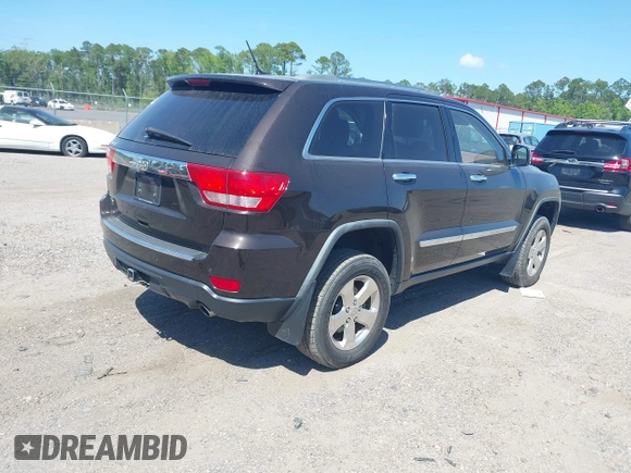 2011 Jeep Grand Cherokee Overland with VIN 1J4RR6GT1BC647292, listed as a IAAI auction lot 42069742 with 199,340 mi miles and . Bid and sale history available at DreamBid. Image 4.