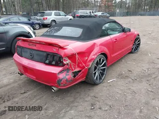2006 Ford Mustang GT Deluxe with VIN 1ZVFT85H265120003, listed as a IAAI auction lot 41810689 with 93,878 mi miles. Bid and sale history available at carsss.com. Image 4.