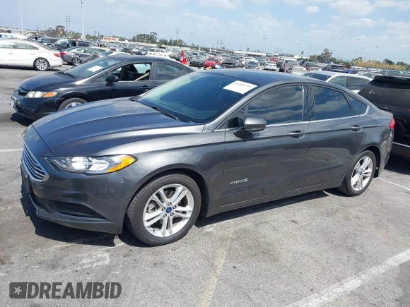 2018 Ford Fusion Hybrid SE with VIN 3FA6P0LU4JR261594, listed as a IAAI auction lot 40360797 with 128,533 mi miles. Bid and sale history available at carsss.com. Image 17.