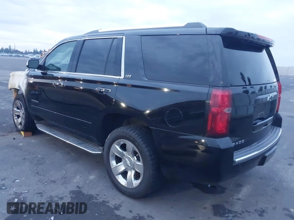 2015 Chevrolet Tahoe LTZ z VIN 1GNSKCKC5FR213209, wystawiony jako IAAI lot #41023368 z przebiegiem Nie podano mil oraz . Historia ofert i sprzedaży dostępna na DreamBid. Obrazek 3.
