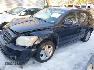 2009 Dodge Caliber SXT with VIN 1B3HB48A89D118869, listed as a IAAI auction lot 41315552 with 198,986 mi miles and . Bid and sale history available at DreamBid. Image 17.