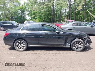 2015 Mercedes-Benz C 300 Luxury with VIN 55SWF4KB5FU002897, listed as a IAAI auction lot 42321165 with 93,960 mi miles and . Bid and sale history available at DreamBid. Image 12.