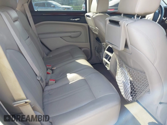 2011 Cadillac SRX Performance Collection z VIN 3GYFNBEYXBS543819, wystawiony jako IAAI lot #42159051 z przebiegiem Nie podano mil oraz . Historia ofert i sprzedaży dostępna na DreamBid. Obrazek 8.