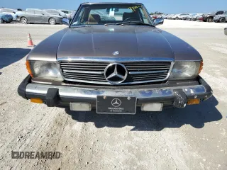 1987 Mercedes-Benz 560 with VIN WDBBA48D7HA063380, listed as a Copart auction lot 77820004 with 81,187 mi miles and Salvage Title. Bid and sale history available at carsss.com. Image 5.