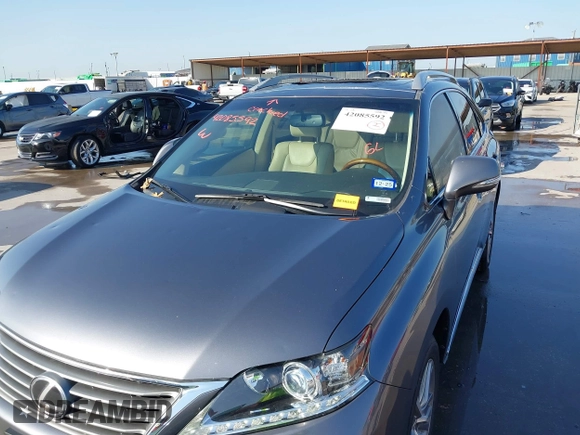 2015 Lexus RX 350 with VIN JTJZK1BA1F2420762, listed as a IAAI auction lot 42085592 with 104,146 mi miles and . Bid and sale history available at DreamBid. Image 6.