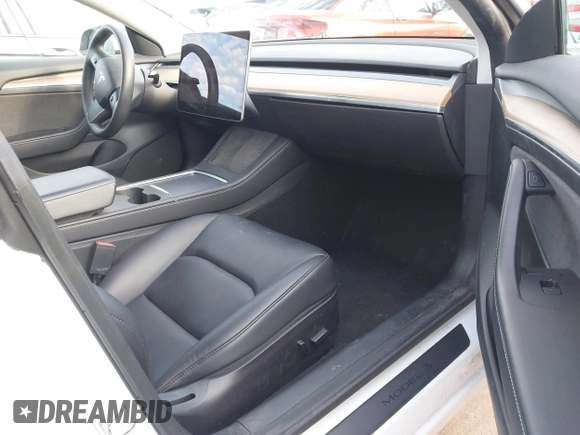 2022 Tesla Model 3 with VIN 5YJ3E1EA8NF210196, listed as a IAAI auction lot 41674407 with 24,270 mi miles. Bid and sale history available at carsss.com. Image 5.