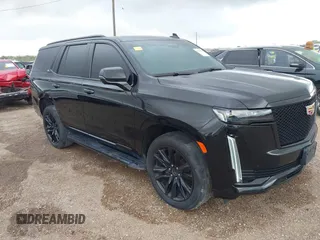2021 Cadillac Escalade Sport z VIN 1GYS3EKL5MR214207, wystawiony jako IAAI lot #42382121 z przebiegiem 81 359 mil mil oraz . Historia ofert i sprzedaży dostępna na DreamBid. Obrazek 1.