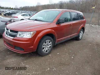 2014 Dodge Journey American Value Pkg with VIN 3C4PDCAB7ET192838, listed as a IAAI auction lot 41917129 with 141,286 mi miles. Bid and sale history available at carsss.com. Image 2.