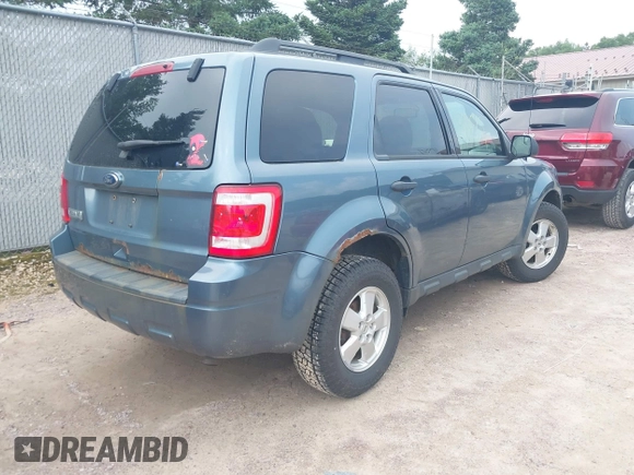 2011 Ford Escape XLT with VIN 1FMCU9D71BKA62118, listed as a IAAI auction lot 42559857 with 104,053 mi miles and . Bid and sale history available at DreamBid. Image 4.