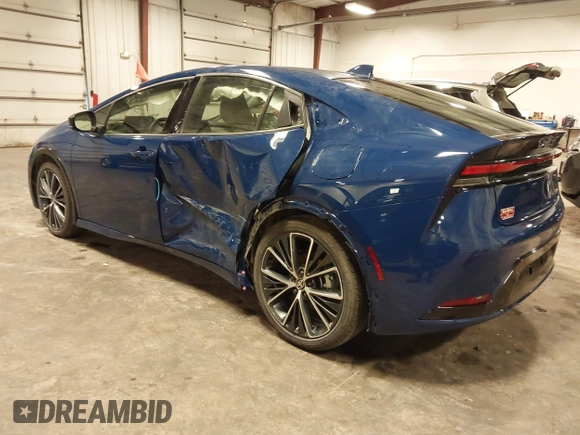 2024 Toyota Prius LE with VIN JTDACAAU1R3045821, listed as a IAAI auction lot 42657634 with 3,574 mi miles and . Bid and sale history available at DreamBid. Image 3.