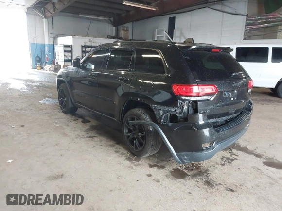2015 Jeep Grand Cherokee Limited with VIN 1C4RJFBG4FC611156, listed as a IAAI auction lot 42021705 with 137,887 mi miles. Bid and sale history available at carsss.com. Image 3.