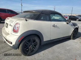 2013 MINI Coupe S z VIN WMWSX3C55DT772606, wystawiony jako Copart lot #43653845 z przebiegiem 39 474 mil mil oraz Czysty tytuł • Clean title. Historia ofert i sprzedaży dostępna na DreamBid. Obrazek 3.
