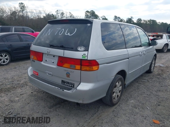 2004 Honda Odyssey EX with VIN 5FNRL18694B118357, listed as a IAAI auction lot 41508682 with 169,017 mi miles and . Bid and sale history available at DreamBid. Image 4.
