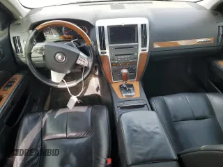 2010 Cadillac STS AWD z VIN 1G6DU6EV1A0150801, wystawiony jako Copart lot #42761515 z przebiegiem 154 865 mil mil oraz Szkoda całkowita • Salvage title. Historia ofert i sprzedaży dostępna na DreamBid. Obrazek 8.
