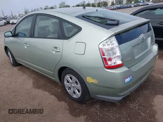 2006 Toyota Prius z VIN JTDKB20U963131145, wystawiony jako IAAI lot #41857847 z przebiegiem 113 251 mil mil oraz . Historia ofert i sprzedaży dostępna na DreamBid. Obrazek 3.