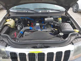 2003 Jeep Grand Cherokee Laredo with VIN 1J4GW48S93C583644, listed as a IAAI auction lot 41656314 with 256,653 mi miles. Bid and sale history available at carsss.com. Image 10.