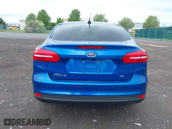 2018 Ford Focus SE z VIN 1FADP3F29JL235302, wystawiony jako IAAI lot #42262964 z przebiegiem 85 127 mil mil oraz . Historia ofert i sprzedaży dostępna na DreamBid. Obrazek 16.