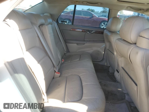2002 Cadillac DeVille DTS with VIN 1G6KF57942U231877, listed as a Copart auction lot 76724554 with 180,082 mi miles and Salvage Title. Bid and sale history available at carsss.com. Image 11.