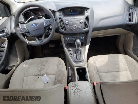 2018 Ford Focus SE z VIN 1FADP3F28JL319269, wystawiony jako Copart lot #59604555 z przebiegiem 167 726 mil mil oraz Szkoda całkowita • Salvage title. Historia ofert i sprzedaży dostępna na DreamBid. Obrazek 8.