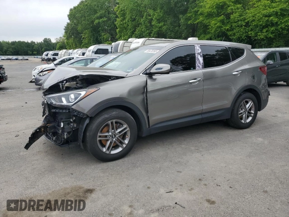 2018 Hyundai Santa Fe 2.4L with VIN 5XYZTDLB9JG563224, listed as a Copart auction lot 58470265 with 133,844 mi miles and Salvage title. Bid and sale history available at DreamBid. Image 1.