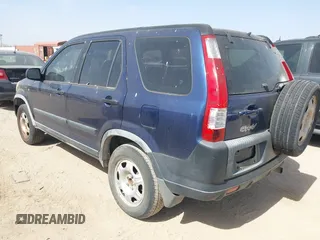 2005 Honda CR-V LX with VIN JHLRD68565C010765, listed as a IAAI auction lot 41843854 with 248,201 mi miles and . Bid and sale history available at carsss.com. Image 3.