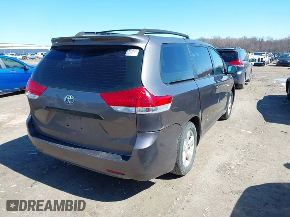 2011 Toyota Sienna with VIN 5TDZK3DC6BS125737, listed as a IAAI auction lot 41815233 with 248,318 mi miles. Bid and sale history available at carsss.com. Image 4.