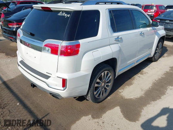 2016 GMC Terrain Denali with VIN 2GKFLVE33G6239999, listed as a IAAI auction lot 42622971 with 162,289 mi miles and . Bid and sale history available at DreamBid. Image 4.