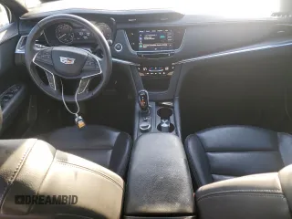 2022 Cadillac XT5 FWD Luxury z VIN 1GYKNAR49NZ159814, wystawiony jako Copart lot #74506584 z przebiegiem 7 069 mil mil oraz Nie do naprawy • Non repairable. Historia ofert i sprzedaży dostępna na DreamBid. Obrazek 8.