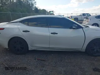 2016 Nissan Maxima SV with VIN 1N4AA6AP4GC386338, listed as a IAAI auction lot 41511559 with 176,957 mi miles and . Bid and sale history available at carsss.com. Image 14.