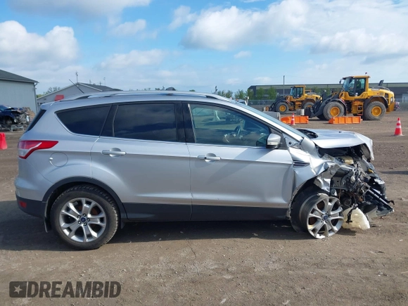 2015 Ford Escape Titanium z VIN 1FMCU9J99FUC75852, wystawiony jako IAAI lot #42171467 z przebiegiem 113 322 mil mil oraz . Historia ofert i sprzedaży dostępna na DreamBid. Obrazek 13.
