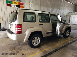 2010 Jeep Liberty Sport with VIN 1J4PN2GK9AW143878, listed as a Copart auction lot 52851095 with 121,357 mi miles and Salvage Title. Bid and sale history available at carsss.com. Image 3.