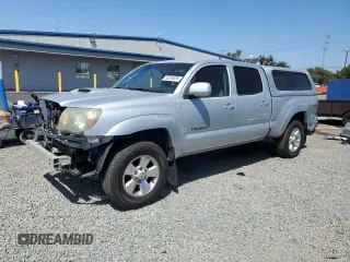 2010 Toyota Tacoma PreRunner with VIN 3TMKU4HNXAM025460, listed as a Copart auction lot 52214035 with 132,520 mi miles and Salvage title. Bid and sale history available at DreamBid. Image 1.