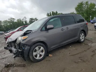 2015 Toyota Sienna LE AAS with VIN 5TDKK3DC3FS572405, listed as a Copart auction lot 58141975 with 146,820 mi miles and Salvage title. Bid and sale history available at DreamBid. Image 1.