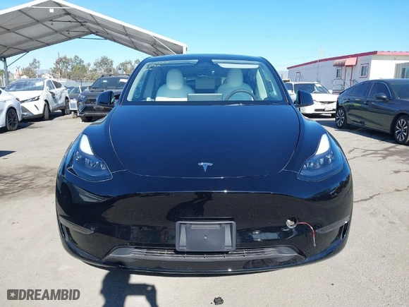 2024 Tesla Model Y with VIN 7SAYGDED6RF152657, listed as a IAAI auction lot 41265862 with NaN miles. Bid and sale history available at carsss.com. Image 12.