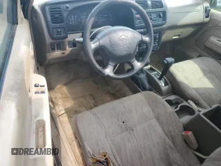 1999 Nissan Frontier XE z VIN 1N6ED26Y4XC344388, wystawiony jako Copart lot #75514124 z przebiegiem Nie podano mil oraz Szkoda całkowita • Salvage title. Historia ofert i sprzedaży dostępna na DreamBid. Obrazek 8.
