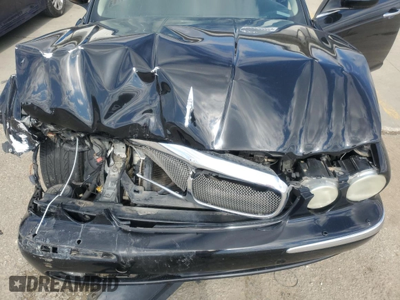2007 Jaguar XJ Vanden Plas z VIN SAJWA82B67SH13461, wystawiony jako Copart lot #49654865 z przebiegiem 151 298 mil mil oraz Szkoda całkowita • Salvage title. Historia ofert i sprzedaży dostępna na DreamBid. Obrazek 11.