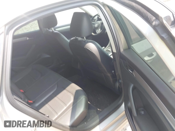 2014 Volkswagen Passat Wolfsburg Edition with VIN 1VWAT7A34EC097719, listed as a IAAI auction lot 42483880 with 255,655 mi miles and . Bid and sale history available at DreamBid. Image 8.