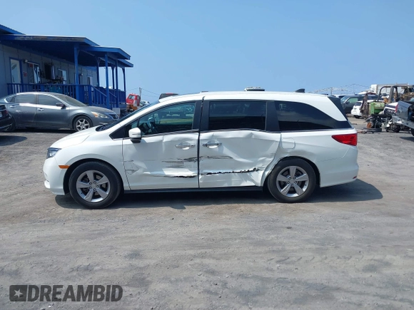 2022 Honda Odyssey EX-L with VIN 5FNRL6H79NB054120, listed as a IAAI auction lot 41694040 with 55,036 mi miles and . Bid and sale history available at DreamBid. Image 14.
