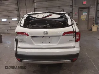2019 Honda Pilot EX-L with VIN 5FNYF6H57KB050130, listed as a IAAI auction lot 42052495 with Not Provided miles and . Bid and sale history available at carsss.com. Image 16.