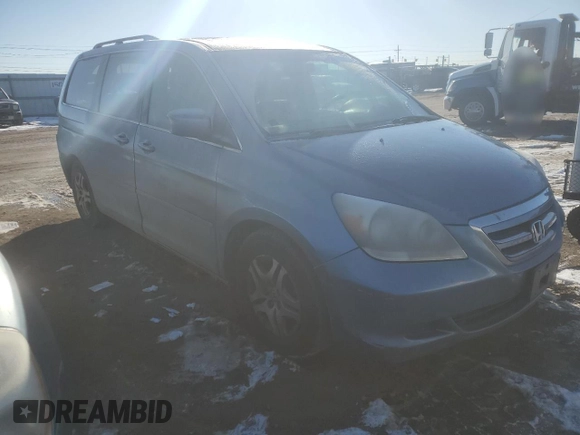 2006 Honda Odyssey EX-L with VIN 5FNRL387X6B013141, listed as a Copart auction lot 42909345 with 220,725 mi miles and Salvage Title. Bid and sale history available at carsss.com. Image 4.