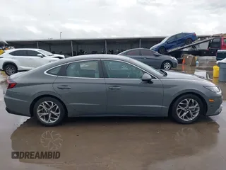 2020 Hyundai Sonata SEL z VIN 5NPEL4JA9LH035459, wystawiony jako IAAI lot #42200766 z przebiegiem 34 027 mil mil oraz . Historia ofert i sprzedaży dostępna na DreamBid. Obrazek 13.