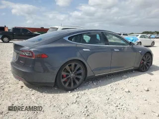 2014 Tesla Model S P85D with VIN 5YJSA1H28EFP62793, listed as a Copart auction lot 52902495 with Not Provided miles and Salvage Title. Bid and sale history available at DreamBid. Image 3.