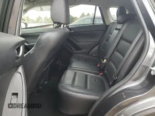 2015 Mazda CX-5 Grand Touring with VIN JM3KE4DY2F0526535, listed as a Copart auction lot 53046855 with 90,288 mi miles and Salvage Title. Bid and sale history available at DreamBid. Image 10.